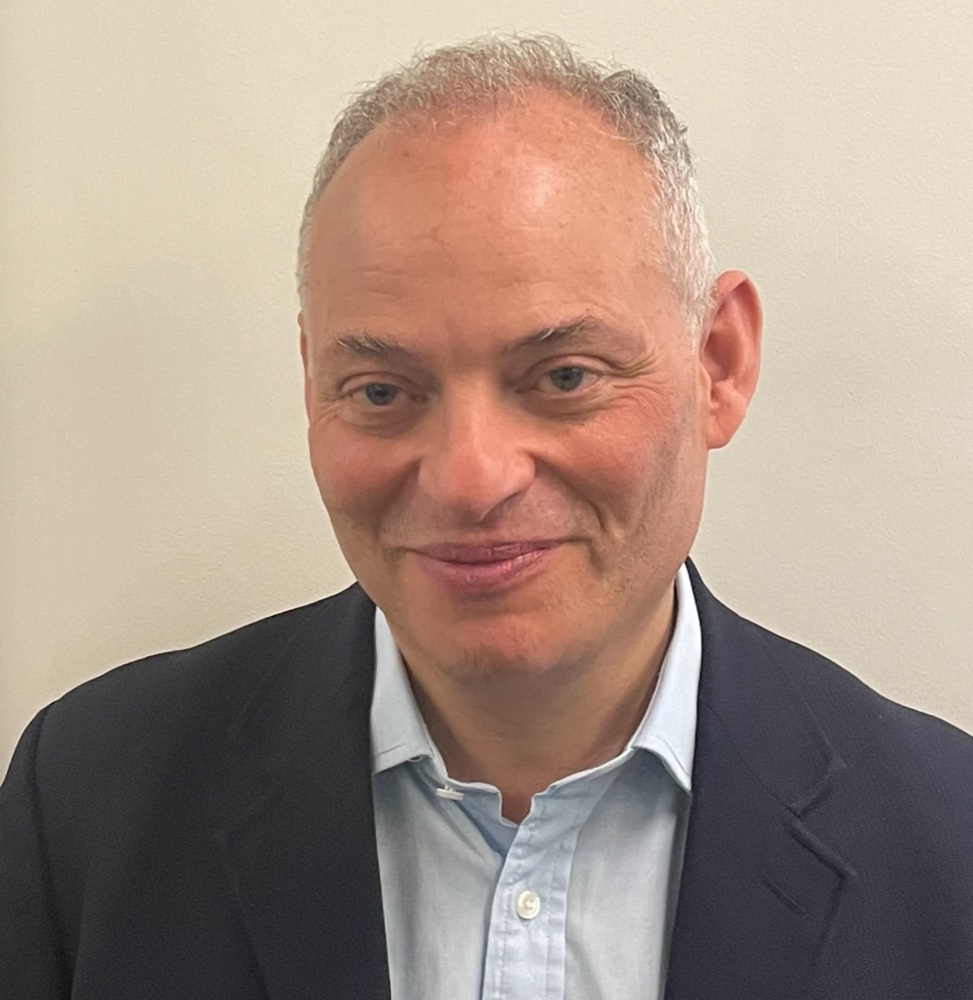 Portrait of Michael Ezra, founder of EzArt Advisory